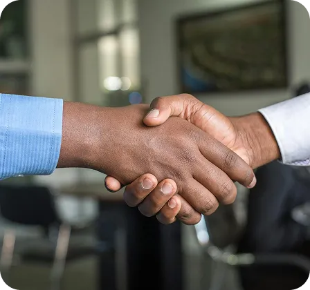 Image of a professional handshake representing dedicated affiliate support and partnership
